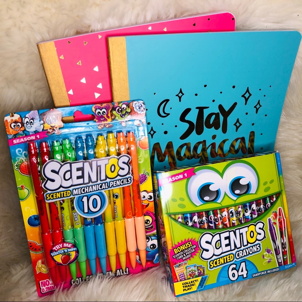 Bundle of notebooks crayons and pencils